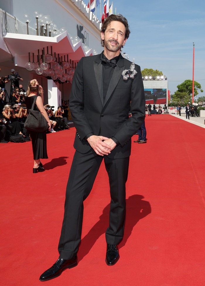 #Venezia81 International Film Festival lights, Dior Ambassador Souheila Yacoub entranced onlookers in #DiorAW24 by Maria Grazia Chiuri, her #DiorCouture ecru wool draped top and wrap skirt casting a magnetic spell on the red carpet.#StarsinDior